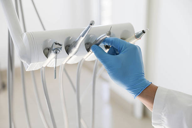 Professional Tooth Extraction technician working in Alma, MI